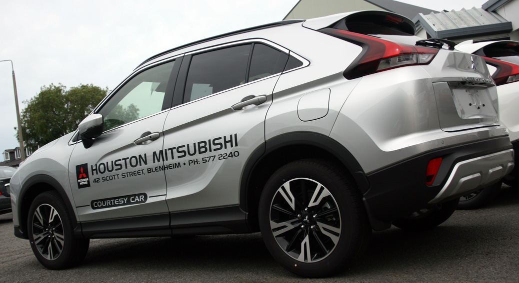 Houston Mitsubishi courtesy car, Eclipse Cross with door graphics